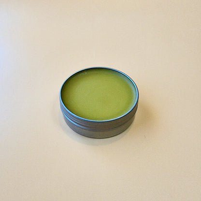 Open tin of MadeFromNature Mullein Salve — natural herbal botanical skin ointment handmade in Canada with health benefits for dry and sensitive skin