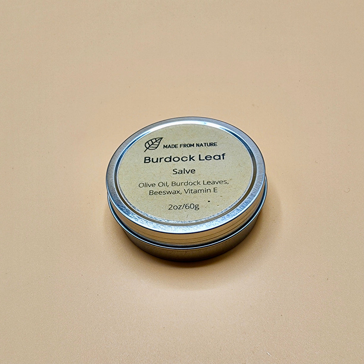Burdock Leaf Salve jar promotes wound healing, particularly in burns and traumatic injuries, and is often used for soothing dry, irritated skin. 